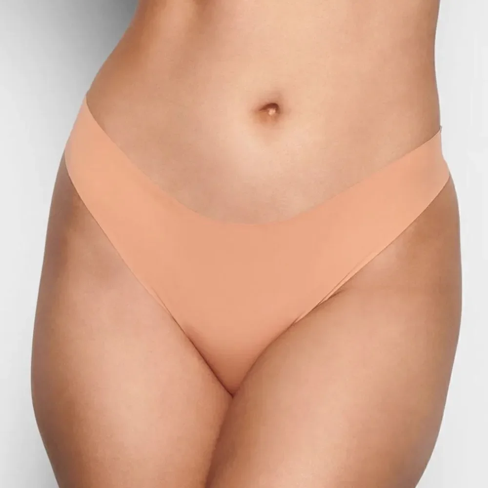 NWT SKIMS Naked Dipped Seamless Thong In Nude Ochre Panty